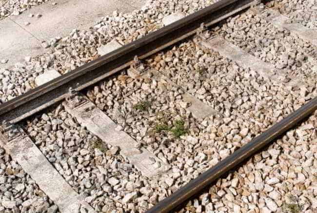 Why stones are laid between railway tracks, know here