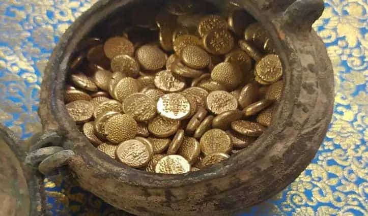 A pitcher filled with gold coins excavated near the Jambukeshwar temple